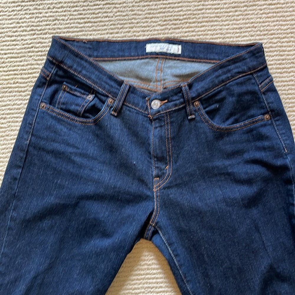 LEVI’S JEANS. Curvy boot cut. In excellent used condition. size 12.